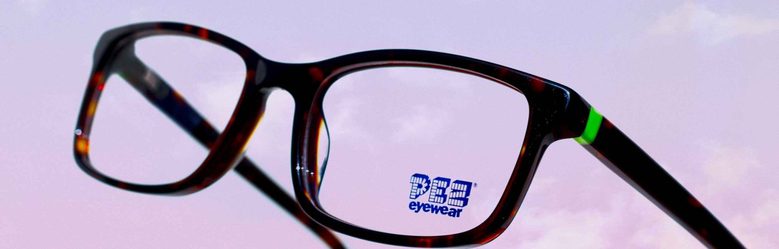 PEZ eyeglasses on a sky background
